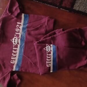 Gucci kids size 3 excellent condition used burgandy color.